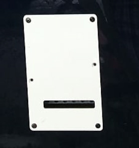 PG 12533- 64: CHARVEL 1996 CHS-1 TREM BACKPLATE WHITE 1-PLY